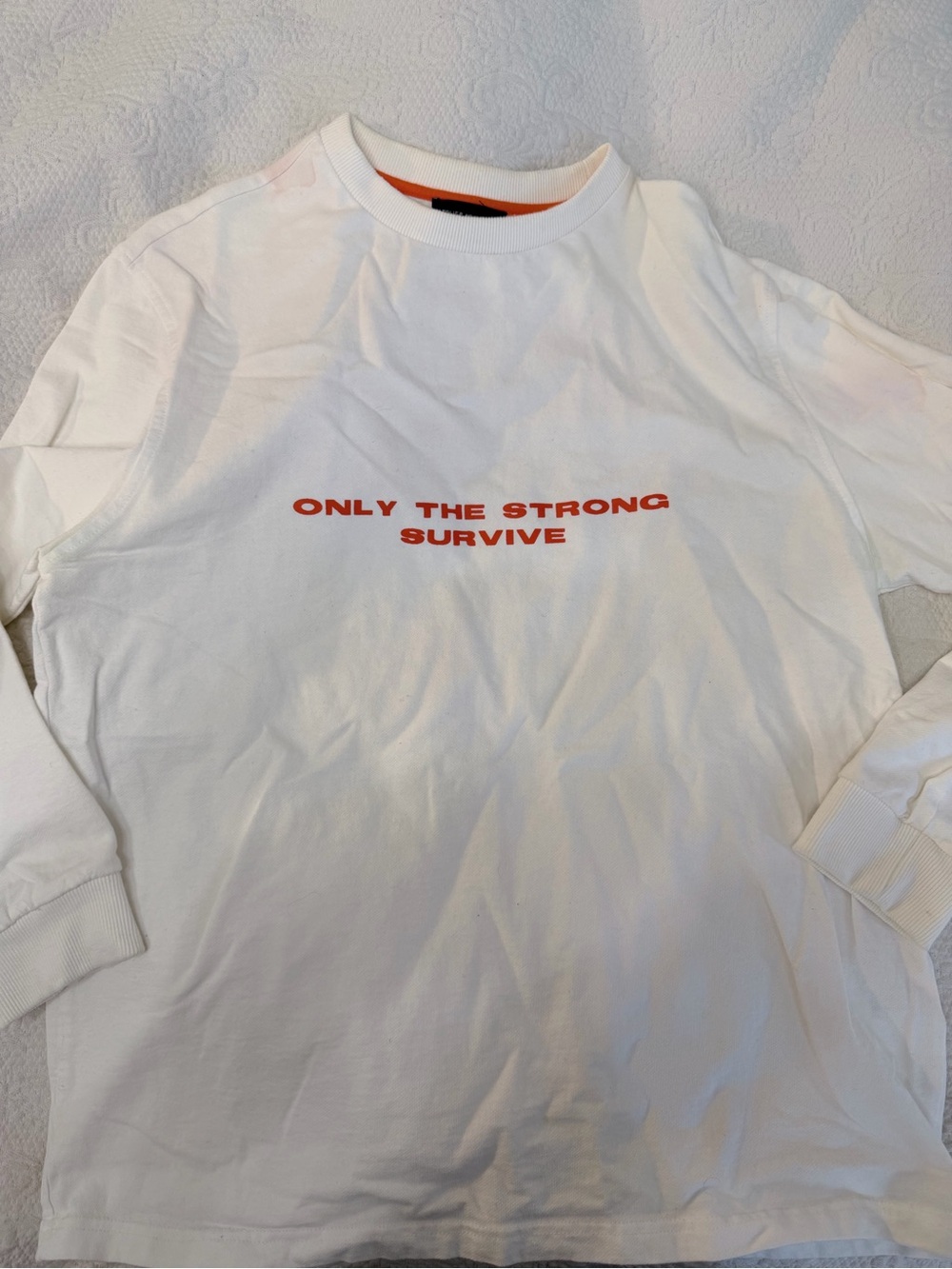 White Long-Sleeve Graphic Tee with Orange Text